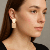 Brass Gold Asymmetric Drop Earring on model