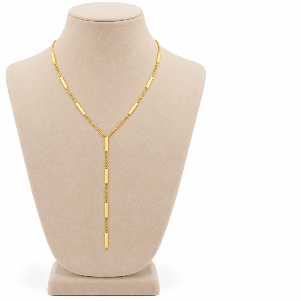 18K gold plated Y-shaped lariat necklace with polished bar stations on a fine curb chain and a three-bar drop, on a white background