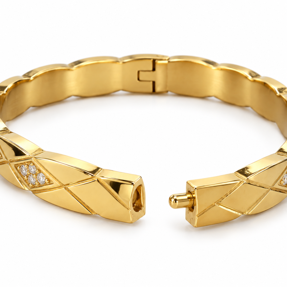 18K gold plated hinged bangle with a faceted quilted diamond pattern and three crystal clusters on a white background