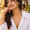 18K gold plated adjustable lariat necklace with a crystal bar slider and two pearl drops on a white background
