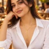 18K gold plated Y-shaped lariat necklace with polished bar stations on a fine curb chain and a three-bar drop, on a white background