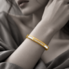 18K gold plated hinged bangle bracelet with a row of clear crystals and mother-of-pearl inlays on professional model