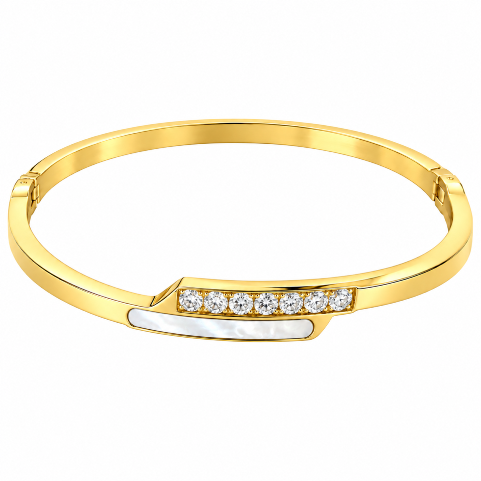 18K gold plated hinged crossover bangle with a bar of clear crystals overlapping a mother-of-pearl inlay on a white background